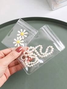 100-Piece Set Of High-Quality Reusable Self-Sealing Bags: Transparent PVC Jewelry Storage Pouches. These Resealable, Anti-Oxidation Bags Are Ideal For Organizing And Preserving Souvenirs, Collectibles, And Various Types Of Jewelry-Including Earrings, Rings, And Necklaces. An Essential Accessory For Jewelry Storage And Maintenance, They Also Serve As The Perfect Containers For Organizing Your Jewelry While Traveling. - Multicolor - View 6