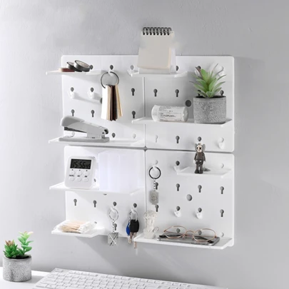 رف تخزين مثبت على الحائط، رف منظم بمجموعة خطاطيف قابل للتركيب، منظم للغرفة والمعيشة ومدخل المنزل، قوي ومتين، سطح ناعم سهل التنظيف، تصميم خالي من الثقوب وآمن على الحائط، مجموعة مرنة من الخطاطيف والرفوف لتلبية احتياجات التخزين المختلفة.