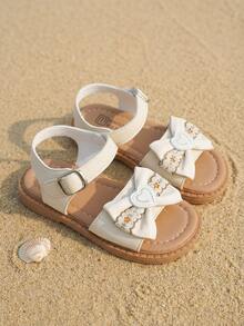 3-12 Jahre alte Mädchen Schleifen Sandalen, beige matte PU Weichmaterial, 3D Schleife & Herz Stickerei, verstellbarer Metallschnalle, Retro Flach Sommerschuhe - Aprikosenfarben - Übersicht 2