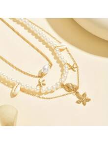 一件式夏季海滩度假贝壳海螺星星多元素女士珍珠项链套装，夏季小众贝壳项链，不易褪色且低过敏性，适合日常佩戴、派对和家庭聚会。 - 金色 - 查看 5