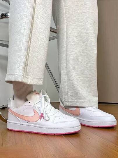  Giày thể thao Nike Court Borough bằng da, kiểu dáng thoải mái, cổ thấp, màu trắng/hồng.
