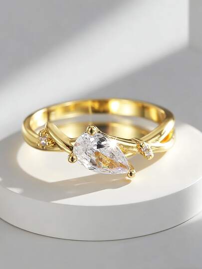 Charm-In 18K Gold Plated Copper Ring Pear Cut Twisted Bypass Shank Design With Mini Accent Stones Cubic Zirconia Solitaire Engagement Ring For Women