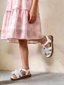 1 đôi dép xăng đan thời trang trẻ em, dép xăng đan đính đá nơ màu trắng cho bé gái, chất liệu mềm mại, chống trơn trượt và chống mài mòn, thiết kế khóa dán, thích hợp cho các buổi tiệc, liên hoan, đám cưới, kỳ nghỉ. - trắng - Xem 2