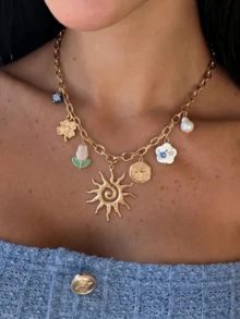 1 chiếc vòng cổ mặt dây chuyền hình mặt trời phong cách Bohemian mùa hè bằng thép không gỉ, với các chi tiết hoa hướng dương, trái tim, hoa gốm và ngọc trai giả, thích hợp cho bãi biển, kỳ nghỉ và đeo hàng ngày. - Nhiều màu - Xem 1
