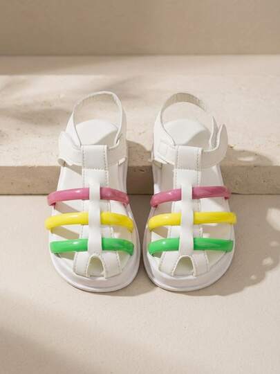 Sandal trẻ em, giày bệt cho bé gái, có thể điều chỉnh kích cỡ, size 3-12 tuổi, màu trắng ngà, mũi kín, quai sọc cầu vồng, màu xanh lá cây pastel, vàng, hồng, đế dày, kiểu La Mã, có khóa dán.