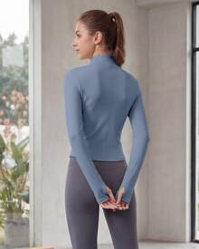 Chaqueta deportiva de manga larga con cremallera de color liso para mujer, corte ajustado y puños con abertura para el pulgar, ideal para fitness, yoga y running. - azul grisáceo - Ver 2
