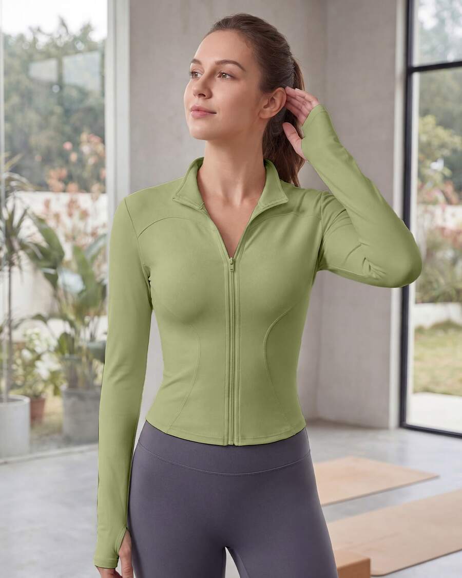 Chaqueta deportiva de manga larga con cremallera de color liso para mujer, corte ajustado y puños con abertura para el pulgar, ideal para fitness, yoga y running. - Verde - Ver 1