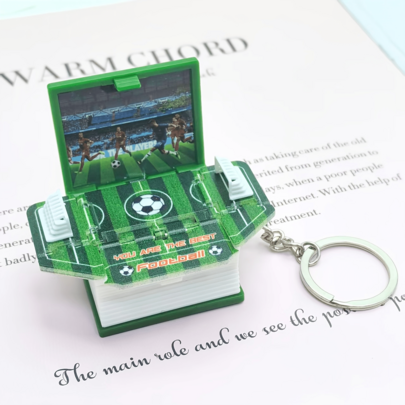 1 móc khóa hình quả bóng đá World Cup 2026, mặt dây chuyền hình cuốn sách có thể gập lại, thích hợp làm quà tặng tiệc bóng đá, phần thưởng sự kiện thể thao, đồ sưu tầm cho người hâm mộ thể thao, quà tặng sinh nhật vui nhộn cho bạn bè (Kiểu ngẫu nhiên)