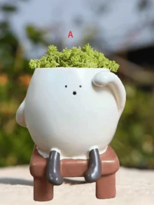 笑脸多肉植物盆栽：一款独特的笑脸造型多肉植物盆栽，底部没有排水孔。这款趣味十足、别具一格的多肉植物盆栽适合室内外装饰。 - 彩色 - 查看 14