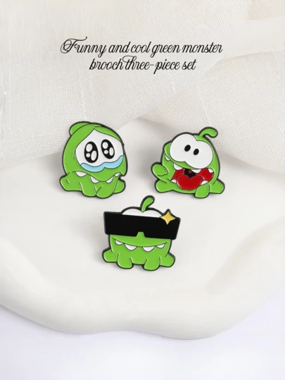 1PC Cute Cartoon Green Small Monster Alloy Enamel Brooch, With Bright And Vibrant Colors, Is Small, Exquisite, And Durable. It Pairs Well With Green Tops And White/Khaki Backpacks, Fitting Various Dressing Styles Such As Sweet And Cool, Japanese, Retro, And Casual. As A Versatile And Personalized Small Accessory, It's A Perfect Small Surprise For Valentine's Day, Birthdays, And Graduation Anniversaries.