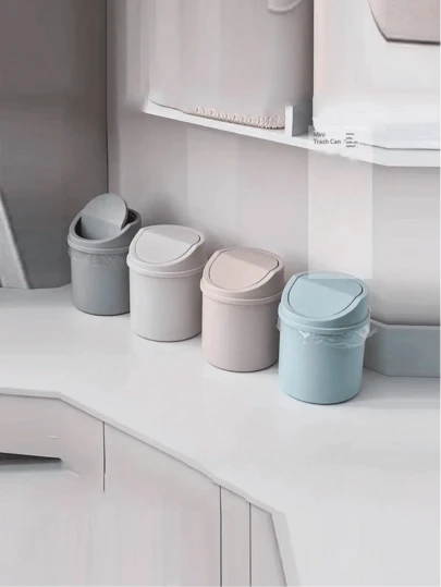Thùng rác mini, thùng rác nhỏ có nắp đậy, thùng rác để bàn, giỏ đựng giấy vụn bằng nhựa để bàn, thiết kế nắp xoay giúp ngăn mùi hôi, dùng để đựng vỏ trái cây và giấy vụn trên bàn làm việc cho gọn gàng, thích hợp trang trí bàn làm việc tại nhà, bàn cà phê, văn phòng, phòng khách, phòng học.