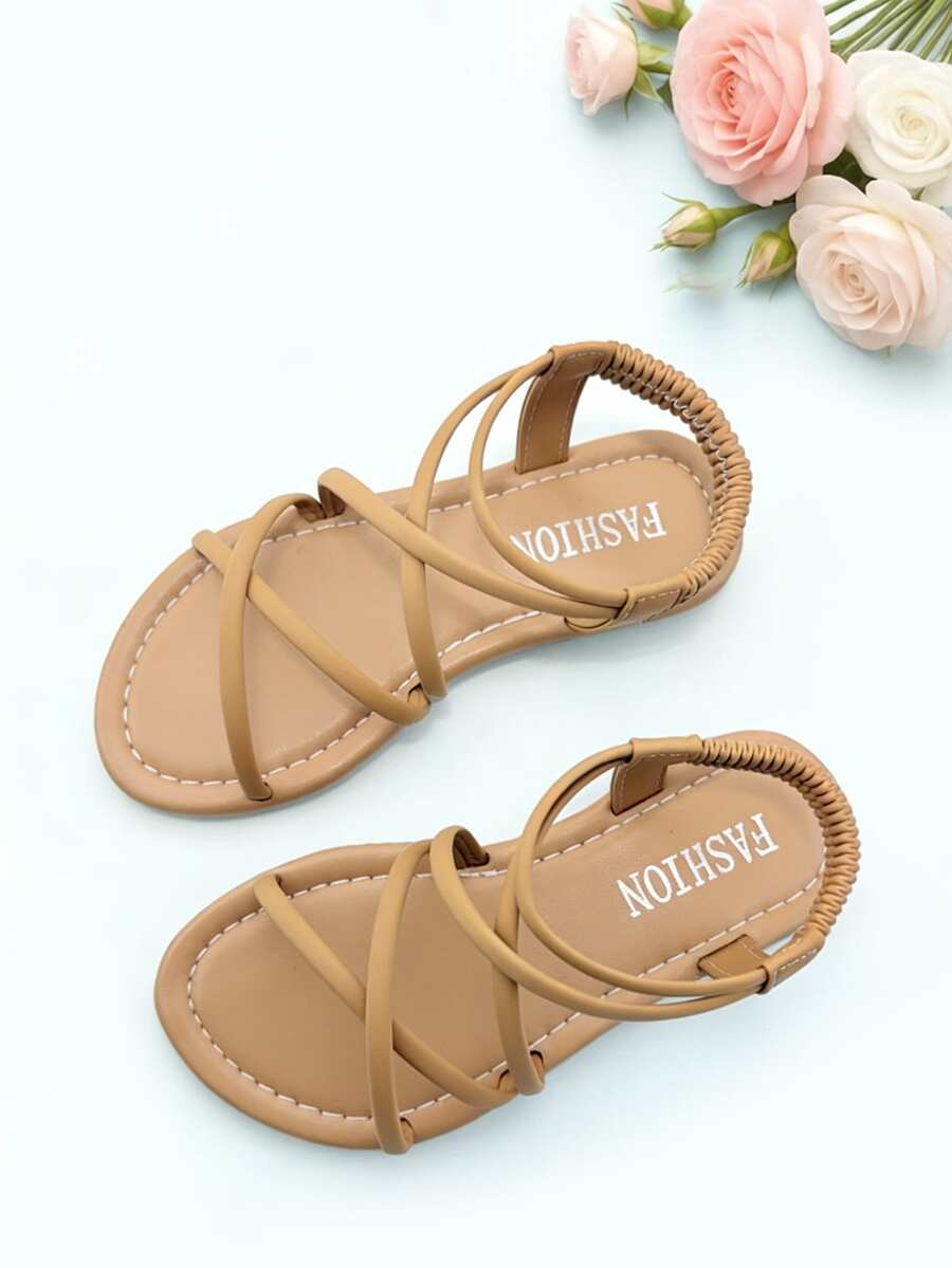 1 đôi dép xăng đan trẻ em màu kaki thời trang, dép xăng đan đế bằng mùa hè cho bé gái, thiết kế quai chéo co giãn, đế mềm chống trơn trượt, thích hợp cho các buổi tiệc, họp mặt, đám cưới, kỳ nghỉ. - Màu Khaki - Xem 1