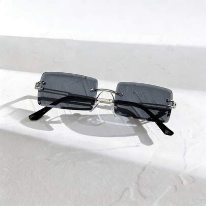 1副男士长方形无框防紫外线时尚眼镜，适合夏季露营、海滩派对等场合佩戴。