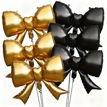 Conjunto de 6 balões metalizados com laços em preto e dourado, incluindo 6 balões. Ideal para aniversários, festas, comemorações, decoração de feriados, cenários, eventos ao ar livre, criação de atmosfera e adereços para fotografia. - Ver 1