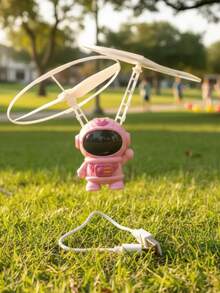 Mini Juguete Volador de Astronauta Kawaii con Luces LED y Sensor de Movimiento - Recargable USB - Rosa - Ver 1