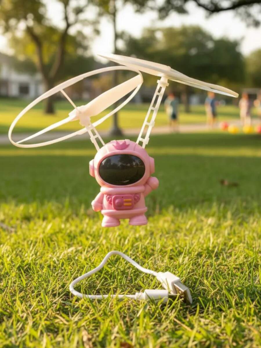 Mini Juguete Volador de Astronauta Kawaii con Luces LED y Sensor de Movimiento - Recargable USB - Rosa - Ver 1