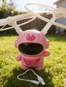 Mini Juguete Volador de Astronauta Kawaii con Luces LED y Sensor de Movimiento - Recargable USB - Rosa - Ver 3
