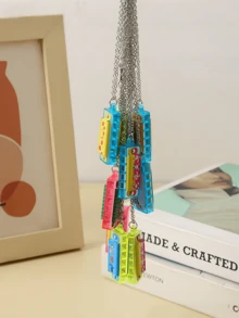 1个可演奏迷你口琴项链和4孔4音钥匙扣，卡通塑料乐器玩具，理想的派对礼物和完美礼品 - 彩色 - 查看 5