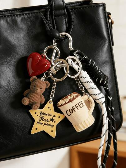 1 pieza Lindo llavero de oso y taza de café para mujer, encantos de bolso con taza de estrella de tela, encantos de bolso con corazón rojo romántico, llavero de cuerda trenzada, accesorio colgante de mochila Y2k, para bolsos, carteras, mochilas, bolsas de viaje, llavero decorativo, adecuado para gimnasio, aula, juegos de emparejamiento, uso diario y regalo, accesorio de moda para mujer, regalo perfecto para Navidad, San Valentín, cumpleaños y temporada de regreso a clases