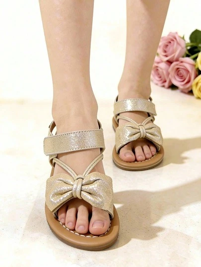 1 Pair Fashion Children's Sandals, Gold Girls' Flat Sandals With Bow Decor, Soft Non-Slip Sole, Easy To Wear, Hook And Loop Design, Suitable For Banquets, Gatherings, Parties, Weddings, Vacations