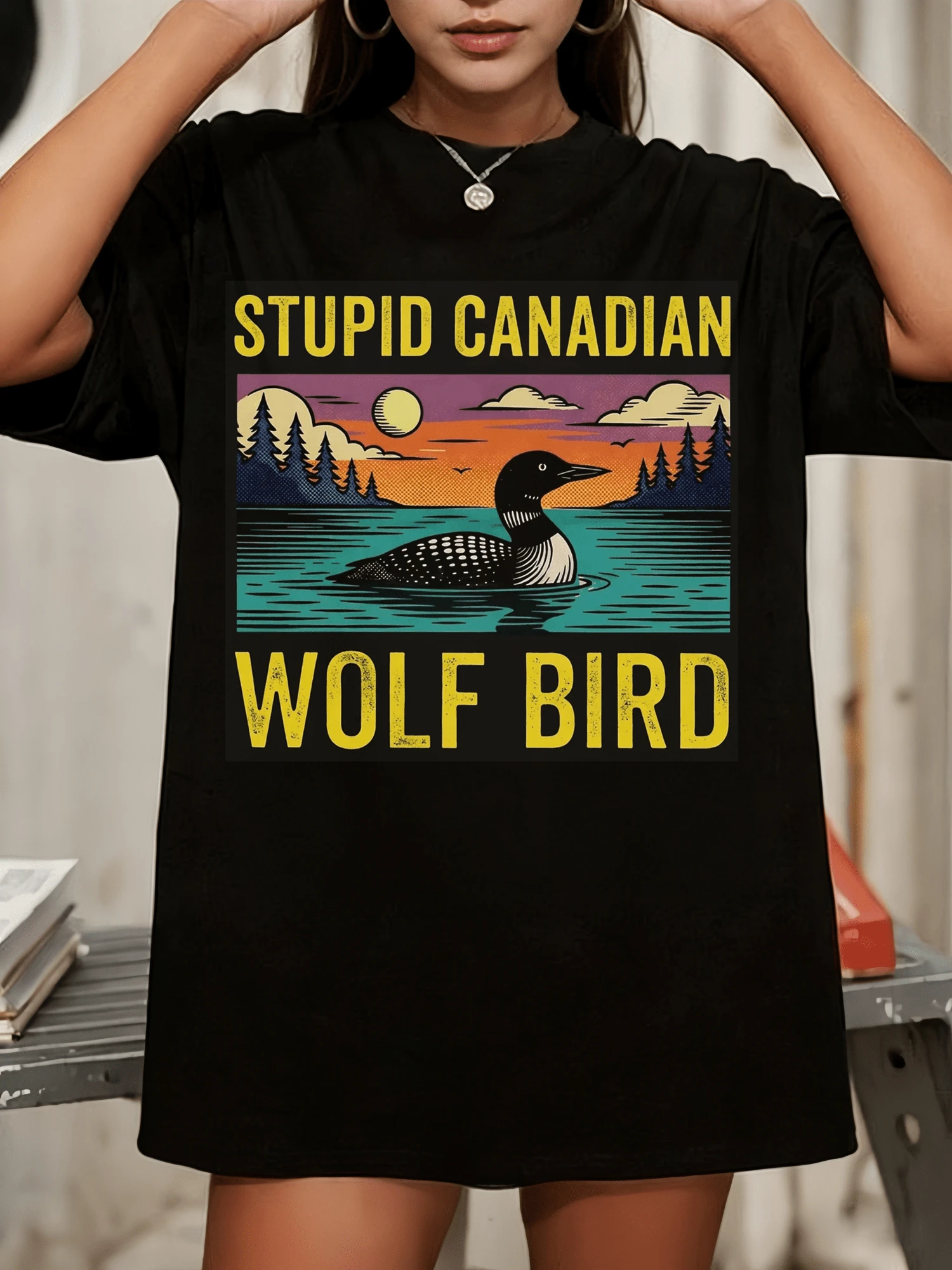 Stupid Canadian Wolf Bird, Loon Lover, Canadian Wildlife - Heated Rivalry Essential T-Shirt - Black - View 1