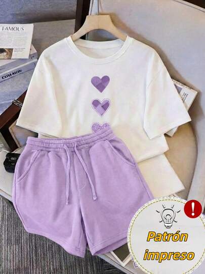 Conjunto casual de dos piezas para mujer - camiseta de manga corta con estampado de corazón azul + pantalones cortos con cordón, un atuendo cómodo adecuado para el uso diario.