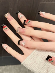 10片手工压制鸭嘴形美甲贴纸，樱桃图案，甜美清新，黑色法式风格，易于佩戴。适合女孩和女士参加节日派对、音乐节和日常佩戴，也是情人节和母亲节的理想礼物。 - 黑與白 - 查看 3