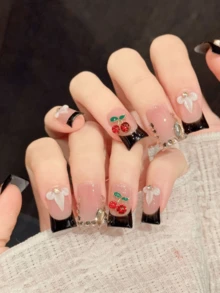 10片手工压制鸭嘴形美甲贴纸，樱桃图案，甜美清新，黑色法式风格，易于佩戴。适合女孩和女士参加节日派对、音乐节和日常佩戴，也是情人节和母亲节的理想礼物。 - 黑與白 - 查看 4