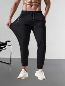 男士黑色速干休闲运动裤，抽绳腰带，侧边拉链口袋，可调节抽绳腰带，适合日常健身和休闲穿着 - 黑色 - 查看 6