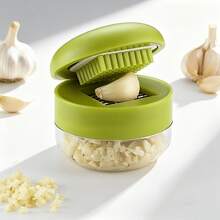 1个重型蒜蓉压榨器和蒜蓉器 - 手动蒜蓉压榨器和蒜蓉器，带易于清洁的蒜蓉盘，小巧手持式设计，塑料材质，含蒜瓣压榨器（不含蒜瓣） - 可放入洗碗机清洗 - 綠色 - 查看 1
