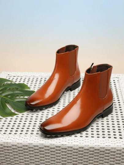 1 đôi giày Chelsea nam mũi tròn, cao đến giữa bắp chân, gót thấp, chất liệu da PU, đế cao su, thoải mái, phù hợp cho mang hàng ngày.