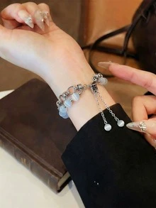 18毫米、20毫米、22毫米花卉金属珐琅表带 - 时尚替换表带，兼容三星Galaxy Watch 6/5/4（40毫米/44毫米）、Galaxy Watch 5 Pro、Galaxy Active 2、Watch 6/4、GT4/GT3/GT2 Pro - 舒适，女士款式 - 白銀貓眼 - 查看 3