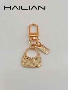 HAILIAN An Alloy Bag Charm Designed In The Style Of A Shoulder Bag, Featuring A Small Square Pendant Inscribed With A Spell. It Serves As A Versatile Accessory-Perfect As A Bag Charm, A Car Key Chain, Or A Small Festive Gift. - Gold - View 4