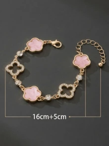1 chiếc vòng tay mặt dây chuyền hình hoa bốn lá sang trọng, đính đá pha lê hồng và trắng, thích hợp làm quà tặng Ngày của Mẹ và đeo hàng ngày. - Vòng đeo tay - Xem 2