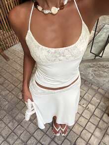 Bộ đồ nữ mùa hè gồm áo hai dây và chân váy ngắn, thích hợp cho các buổi hẹn hò tối, tiệc chiêu đãi và các bữa tiệc. Màu trắng. - trắng - Xem 3