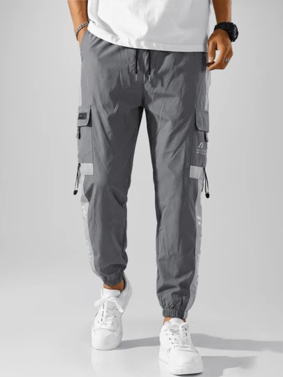 CZRLHYT Quần jogger nam kiểu cargo cạp chun, túi chéo, thiết kế độc đáo bên hông, phù hợp cho mọi hoạt động ngoài trời.