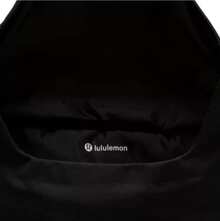 Lululemon Curved Crossbody Bag 3L | Ergonomic Half-Moon Silhouette | Water-Repellent High-Density Nylon | Interior Organization Pockets | Adjustable Strap For Custom Fit | The Ultimate Minimalist Essential - Black - View 8