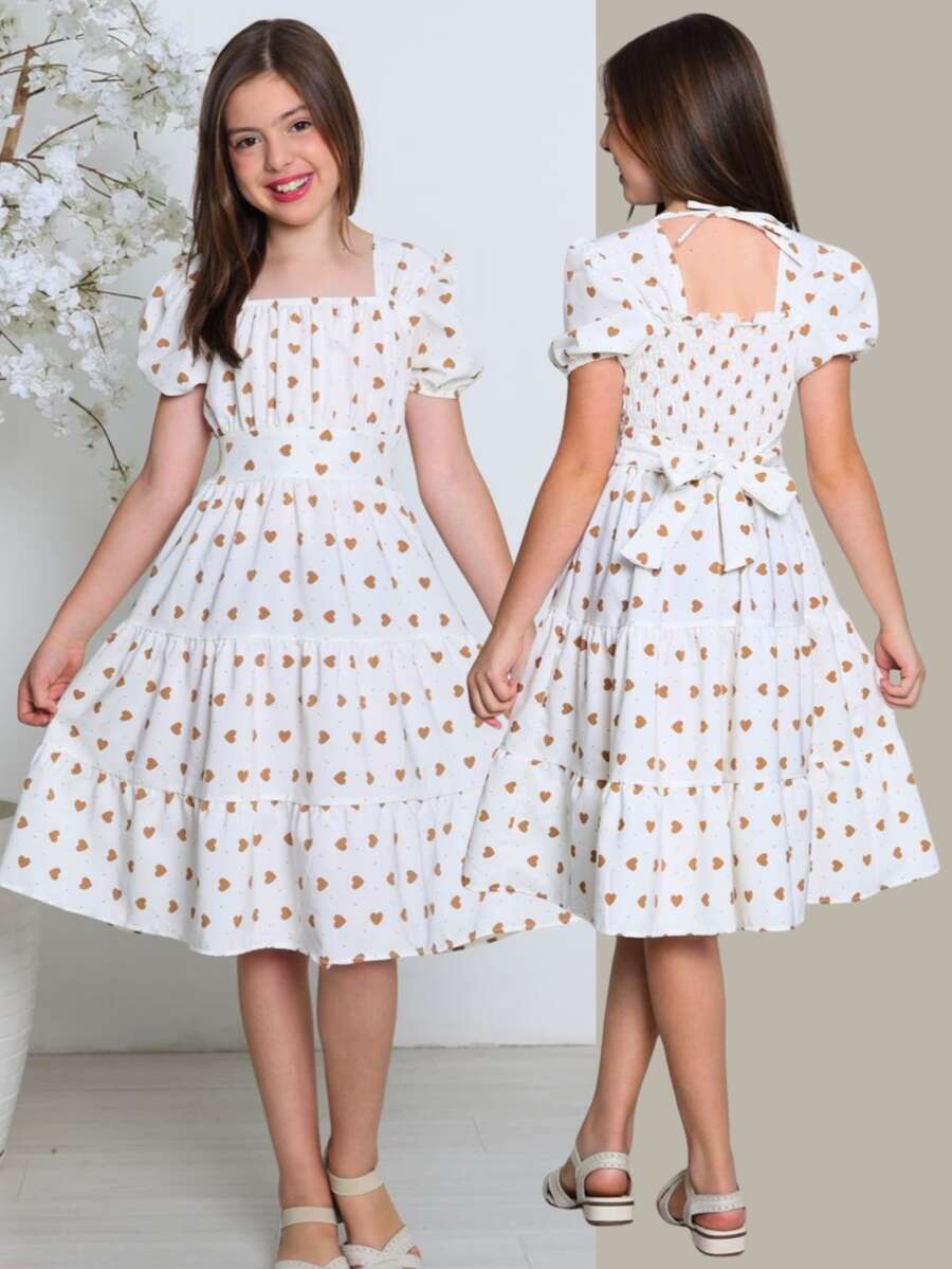 Girls' Junior Dress, Flared, Heart Print, Evangelical Style, Puff Sleeves, Defined Waist, Bow Back, Ruffle, Godet Skirt, Comfortable, Loose-Fitting, Lightweight, Delicate And Elegant Look, Suitable For Girls 10, 12, 14, And 16 Years Old, Teen Fashion, Party, Outing, Casual, Charming Look, Perfect Fit, Soft, Breathable Fabric, Secure Fit, Modern Design, Stylish Flared Dress, Elastic Back Detail, Adjustable Fit, Body-Shaped Tie, Exclusive Charm, Versatile Piece For Everyday And Special Occasions, Comfortable, Durable, High Quality, Impeccable Finish, Delicate Heart Print, Loose Fit, Natural Movement, Elegant Junior Clothing, Premium Girls' Flared Dress, Sophisticated Look, Comfortable, Lightweight, Fresh, Modern Princess Style, Highlight, Junior Wardrobe, Complete Look, Elegance, Comfort, Beauty, Practicality - 白色 - 查看 1