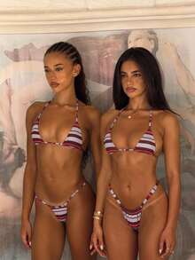 女士条纹比基尼套装。采用高弹亲肤面料制成。细肩带设计凸显颈部和肩部线条，搭配吸睛的复古条纹印花。高腰三角泳裤拉长腿部线条。是海滩度假的理想之选，也是打造复古度假风的绝佳选择。粉色夏日 - 粉色 - 查看 9