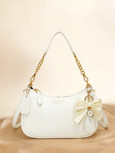 This Women's Shoulder Bag Is Made Of Solid Color PU Material, Decorated With Letter Accents, Bow, And Pearl Pendant, Exuding A Fashionable Vibe. The Bag Features A Zipper And Metal Chain Design, Making It Stylish And Versatile. It Can Be Easily Worn Across The Body To Elevate Your Overall Look. The Spacious Interior Can Accommodate Daily Essentials Like Lipstick, Keys, Cosmetics, Etc., Suitable For Commuting, Outings, Dates, Shopping, And Various Everyday Occasions For Women., Cream Bag