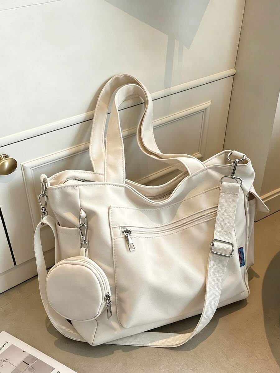 Túi đeo vai 2 trong 1 kiểu dáng cổ điển hình chú hề, màu trơn, dung tích lớn, có ngăn phụ, thích hợp sử dụng trong trường học năm 2024. Chiếc balo này cũng phù hợp cho thanh thiếu niên, phụ nữ hoặc học sinh, với dung tích lớn, chống thấm nước và ngăn đựng laptop, là lựa chọn lý tưởng cho mùa tựu trường. Có thể dùng làm balo học sinh, túi xách học sinh, túi đựng sách học sinh, vật dụng cần thiết cho mùa tựu trường, và cũng có thể làm quà tặng cho giáo viên.