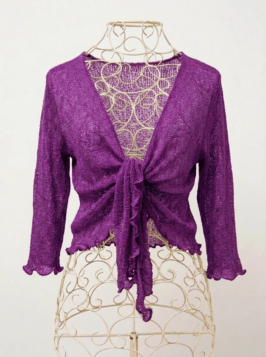 Chaqueta Mágica Mujer (talla unica) Cardigan Punto Calado Liso Color Sólido Tejido Tipo Lana Ligera (Imitación Lana) sin Botones con Nudo Frontal Bordes Acaracolados Alta Elasticidad Básica Clásica Versátil Fácil de Combinar con Vestido Falda Top Camiseta de Tirantes Estilo Suave Cómodo Moda Casual Elegante Diario Fiesta del Té Desayuno Concierto Música Country Viaje Aeropuerto Vacaciones Regreso a Casa Cumpleaños Noche de Fiesta Despedida de Soltera Outfit Formal e Informal Chaqueta Abierta Ligera Transpirable Ajuste Flexible para Diferentes Tipos de Cuerpo Ropa Mujer chaqueta magica - Morado - Ver 1