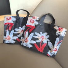 50个9.8 x 13.8英寸派对礼服包装袋，女士购物袋，高端装饰包装袋，加厚防水便携大容量手提袋，花卉图案包装袋，户外旅行日常手提袋。装饰礼品包装袋，可重复使用包装袋，适用于节日、新年、婚礼、派对、购物、生日礼品袋、派对装饰礼品袋。 - 包裝袋 - 查看 2