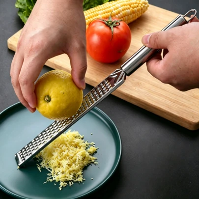 1pc Portable Stainless Steel Citrus Zester & Lemon Grater With Long Handle, Multipurpose Sharp Manual Grater For Chocolate Cheese Spices Fruit Peeling, Durable Rustproof Lightweight Kitchen Gadget Easy To Grip Clean Store Ideal For Outdoor Camping Picnic Home Kitchen Cooking Baking Daily Use