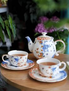 1 Set Hand-Painted Gold Rim Lotus Pattern Blue And White Ceramic Cup And Saucer Set, Unique Classical Asymmetrical Coffee Cup, Fusion Of Chinese And Western Floral Ceramic Cup And Saucer, Suitable For Afternoon Tea, Milk Coffee Cup, Dessert Plate, High-End Gift For Friends, Applicable For Home, Restaurant, Cafe, Gathering - Blue - View 6