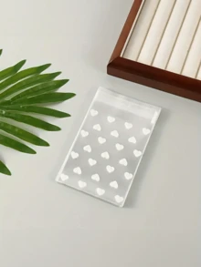 1/25/50/100个装创意透明心形自粘包装袋，适用于饼干、糖果和甜点，是礼品和庆典包装的理想之选，非常适合情人节、婚礼和其他节日。 - 查看 6