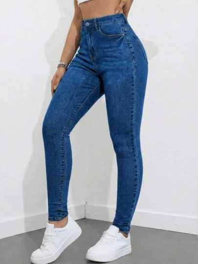 Pantalones azules de talle alto y corte ajustado: corte ajustado, detalles de botones en la parte delantera, tejido vaquero elástico, cómodos de llevar.