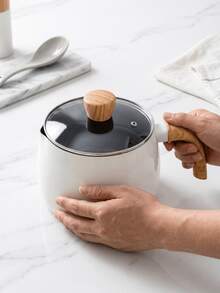 This Japanese-Style Non-Stick Milk Pot Features A Single-Handle And Lid Design, Very Suitable For Single-Serving Use. The Simple Pure White Design Has No Printed Patterns, With Thoughtful Details Such As The Beechwood Lid Handle, Rounded And Smooth Pot Body, And Thickened Composite Bottom. - View 10