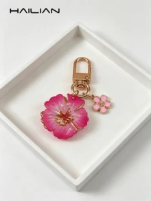 HAILIAN Llavero con flor linda, colgante de bolso de resina de hibisco con degradado y mini flor colgante, llavero chapado en oro, adecuado para billetera, mochila, bolso de mano, decoración de llaves de coche, gran regalo para mujeres y niñas (disponible en rosa/rojo) - Rosa Fucsia - Ver 4