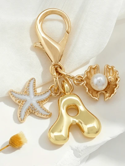 1pc A-Z Letter Gold Bubble Alphabet Charm Keychain, Decorated With Starfish And Shell Accessories, Suitable As Keychain, Ring, Bag Charm, Backpack Hanger, Car Pendant, Great For Shopping, Beach, Camping, Wallet And Handbag, Ideal Gift For Women, Friends, Students, Fashionable And Creative Design, Birthday Gift, Summer Bag Charm, Halloween Accessory, Teacher's Day Gift Gifts For Mother, Father, Graduation, And Teacher